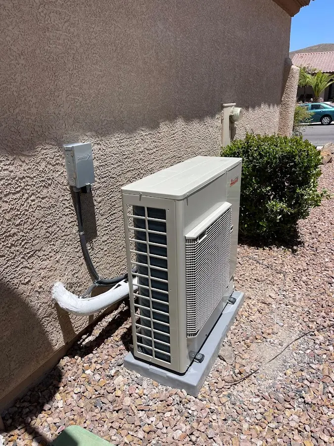 Residential air conditioning condenser unit in Auburn